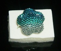 Anillo Ajustable Forma Flor Bañado en Plata-Azul